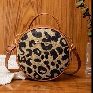Vibrant Leopard Print Round Handbag Crossbody Bag with Zipper Closure